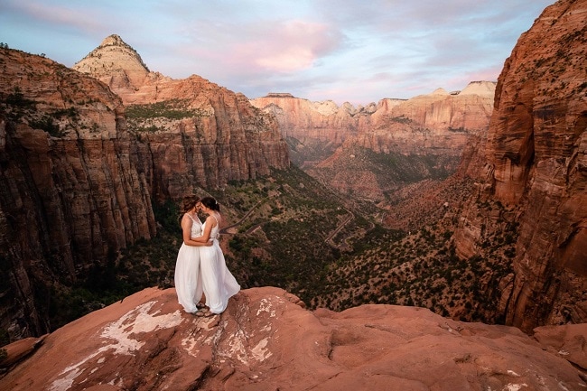 zion-national-park-Same-Sex-Elopement-sunrise-canyon-overlook-portraits-bride-destination-wedding-red-rock-desert-ceremony